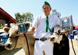 Lemoore 4-H member and Lemoore High School student Jared Thompson shows off some of the hardware he earned in the fair's annual livestock judging. 